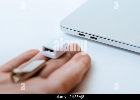 Man uses modern technologies to store memory and digital data Stock Photo