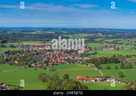 Aerial view of the agricultural landscape with Aschau town in the pre-alpine plateau of Chiemgau region, Aschau, Upper Bavaria, Southern Germany Stock Photo