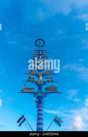 Maypole illustrating the different local crafts in the village Reit im Winkl, Chiemgau region, Upper Bavaria, Bavarian Alps, Southern Germany, Europe Stock Photo