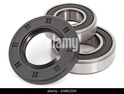 Ball bearings and oil seal, isolated on white background Stock Photo