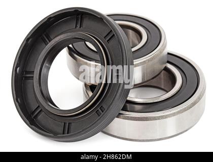 Ball bearings and oil seal, isolated on white background Stock Photo