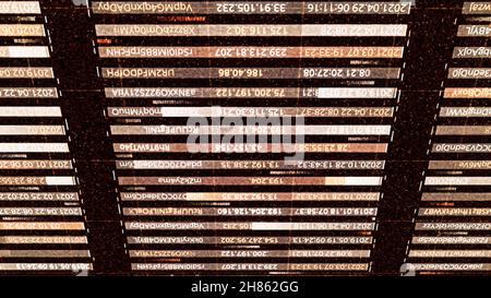 Computer security concept, changing code and password text in a vertical table. Animation. Running lines of symbols on a dark background Stock Photo