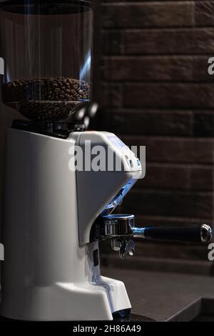 Close-up part of a coffee machine, a holder for coffee. Stock Photo