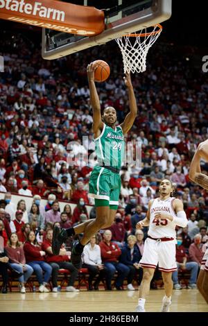 BLOOMINGTON, UNITED STATES - 2021/11/27: Marshall Thundering Herd guard Taevion Kinsey (24) plays against Indiana Hoosiers guard Parker Stewart (45) during an NCAA basketball game on November 27, 2021 in Bloomington, Ind. IU beat Marshall 90-79. Stock Photo