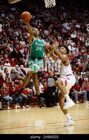 BLOOMINGTON, UNITED STATES - 2021/11/27: Marshall Thundering Herd guard Taevion Kinsey (24) goes to the basketball against Indiana Hoosiers forward Trayce Jackson-Davis (23) during an NCAA basketball game on November 27, 2021 in Bloomington, Ind. IU beat Marshall 90-79. Stock Photo