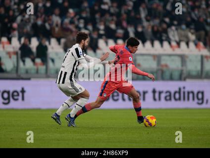 Matteo Pessina of Atalanta Calcio and Manuel Locatelli (Juventus Fc) during the Italian championship Serie A football match between Juventus FC and Atalanta BC on November 27, 2021 at Allianz Stadium in Turin, Italy - Photo: Nderim Kaceli/DPPI/LiveMedia Stock Photo