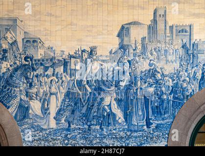 battle of valdevez Painted ceramic tileworks (Azulejos) on the interior walls of Main hall of Sao Bento Railway Station in Porto, Portugal Stock Photo
