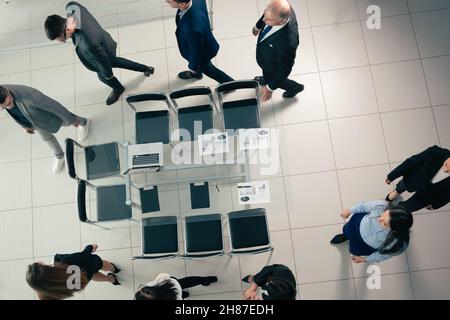 top view. group employees go to the conference room . business concept Stock Photo
