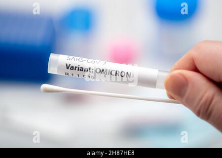 Torquay, UK. Sunday 28 November 2021. Variant of COVID-19 is named by WHO as Omicron. Previously referred to as lineage B.1.1.529. Concept visualisation of swab and testing. Credit: Thomas Faull/Alamy Live News Stock Photo