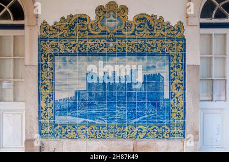 Painted blue ceramic tile panes on the walls of old Obidos Railway Station, Portugal Stock Photo