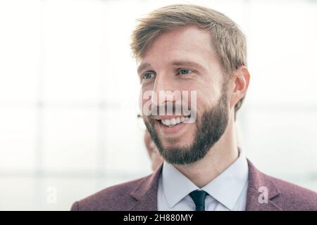 close up. portrait of a smiling young businessman. Stock Photo