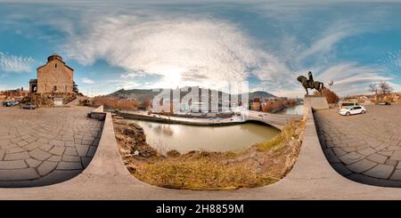 360 degree panoramic view of Tbilisi, Georgia - 2021: City center of Tiflis. Kura bridge. Blue sky. Summer. 3D spherical panorama with 360 viewing angle. Ready for virtual reality