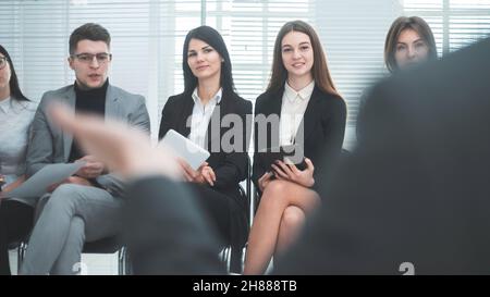 project Manager making a report for the working group Stock Photo