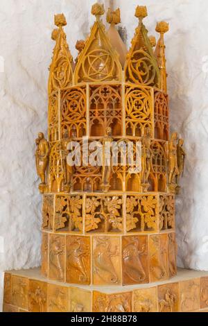 Picture of a retro yellow tile stove in a castle room Stock Photo