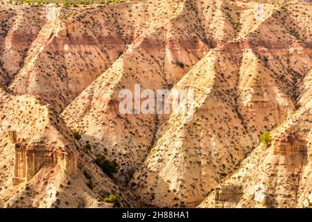 Striped hill formation in the Badlands of Gorafe desert, Andalucia, Spain Stock Photo