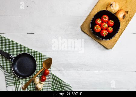 Italian pasta ingredients. Cherry tomato and spices for cooking Stock Photo