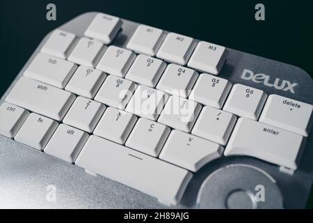 London, UK - 2021.11.27: Product close-up shot of Delux T11 Designer Gaming Keyboard with Custom Keys Group Smart Dial 3 Stock Photo
