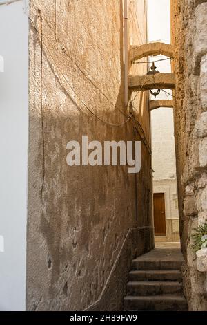 One of the narrow alleys in the center of Monopoli (Puglia, Italy) Stock Photo