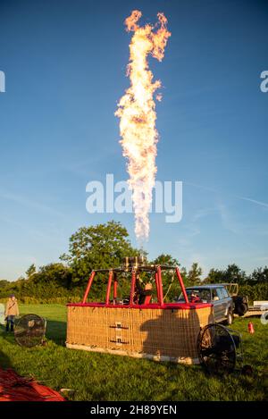Hot Air Balloon firing up Stock Photo