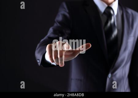 hand pressing a touchscreen button Stock Photo