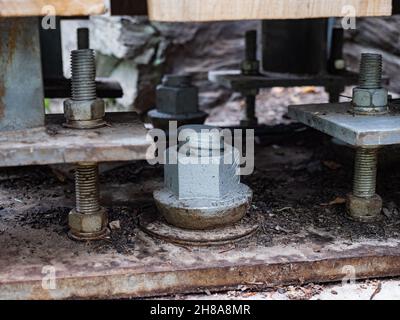 Steel plate based on anchor bolts on the concrete pillar, Footpath bridge base pillar Stock Photo