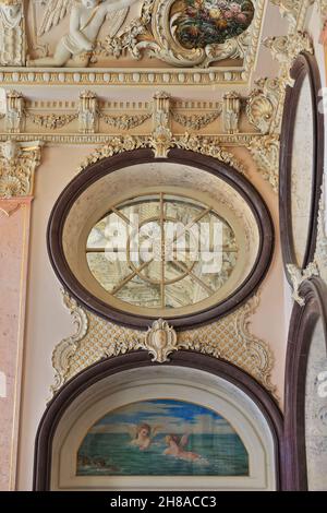 Richly decorated corner-pink Salao Nobre-Noble Hall-gilded stucco-relief cherubs-flower paintings. Estoi-Algarve-Portugal-004 Stock Photo