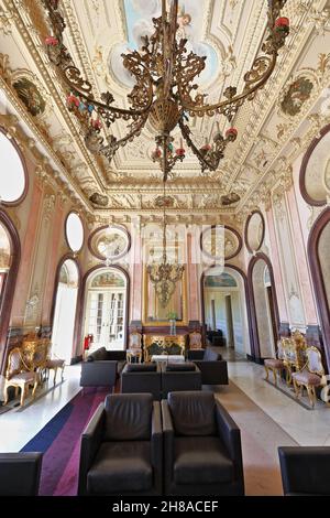 Pink Salao Nobre-Noble Hall-gilded stucco friezes-relief cherubs-big brass chandelier. Estoi-Algarve-Portugal-006 Stock Photo