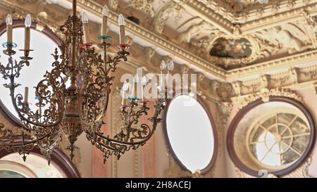 Pink Salao Nobre-Noble Hall-big brass chandelier-gilded stucco friezes-relief cherubs. Estoi-Algarve-Portugal-007 Stock Photo