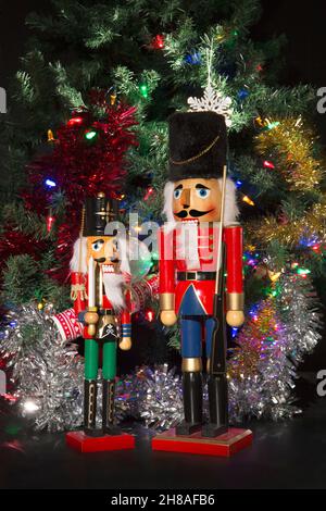 Christmas Nutcrackers with Tinsel and Christmas Tree Stock Photo