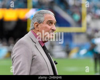 Atlanta Falcons owner Arthur M. Blank watches a replay of San