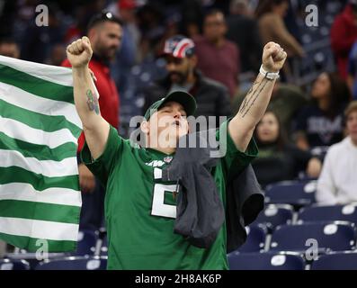 Houston, Texas, USA. November 28, 2021: A New York Jets fan celebrates a 21-14 win over the Texans on November 28, 2021 in Houston, Texas. (Credit Image: © Scott Coleman/ZUMA Press Wire) Credit: ZUMA Press, Inc./Alamy Live News Stock Photo