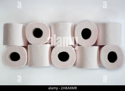 pink patterned tissue paper rolls , toilet paper rolls isolated on white background Stock Photo
