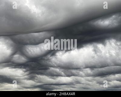 A very strange clouds in the sky above Long Island that produced six tornados in New York. Stock Photo