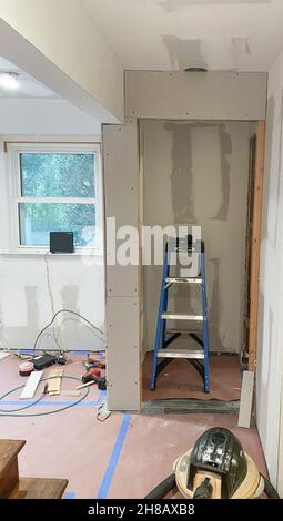 New walls and new rooms under construction in a residential home. Stock Photo