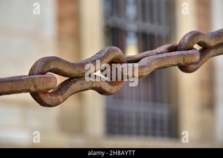 A chain with large iron links. Concept of union, resistance, strength, protection. Selective focus. Stock Photo