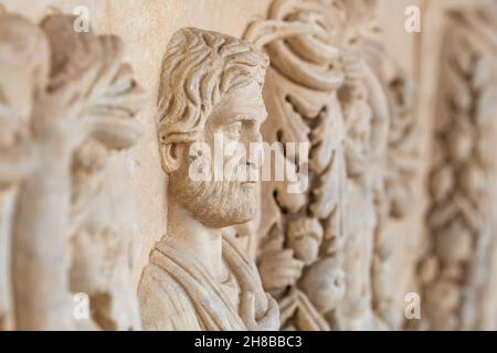 Face relief on the tomb in ancient city of Ephesus, Turkey. Stock Photo