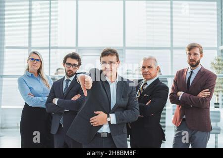 close up. angry businessman giving a thumbs down Stock Photo