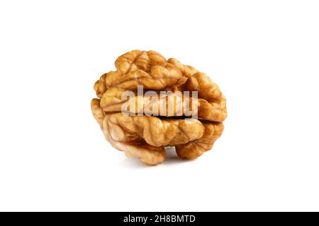 Macro of peeled walnut. Whole walnut kernel isolated  on white background. Stock Photo