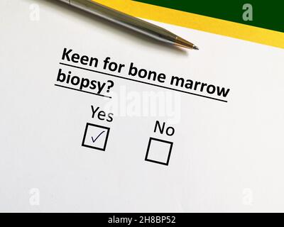 One person is answering question about surgery. The person is keen for bone marrow biopsy. Stock Photo