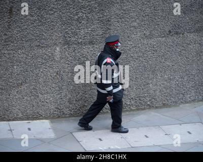 Traffic Warden in Moor Lane, Barbican central London Stock Photo