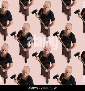 High angle view of bearded bald man, blacksmith wearing leather apron or uniform isolated on pink studio background. Pattern Stock Photo