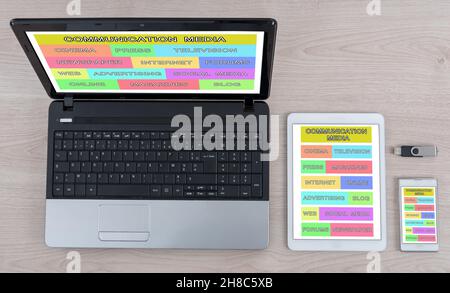 Communication media concept shown on different information technology devices Stock Photo