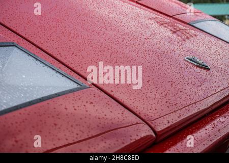 Close up detail of the headlight and bonnet on a red Lamborghini Countach LP400S classic Italian sports car supercar. Stock Photo