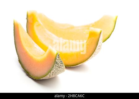 melon, cut open, columns, netted melon, orange, slices, cantaloupe, fruit, sweet, three, vitamin, fat-free, melons, raw food, column, color, web, back Stock Photo