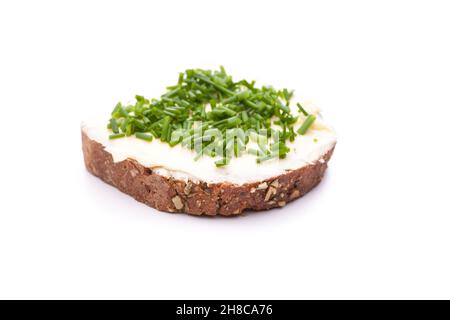 Butter bread with chives isolated on white background Stock Photo