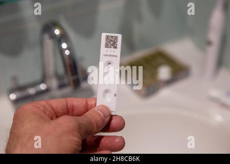 29.11.21. London, England. A hand holding a Lateral flow test indicating a negative result. Credit: SMP NEWS / Ģ����ý Live News Stock Photo