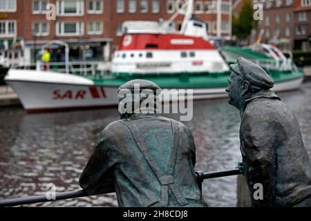 statues Delftspucker at Ratsdelft, Germany, Lower Saxony, East Frisia, Emden Stock Photo