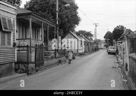 Bridgetown, Barbados - Street scene with wooden houses, March 1980 Stock Photo