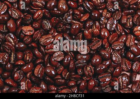 roasted coffee bean background, top view. Flat style and place for text. Stock Photo