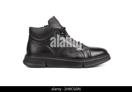 Black leather autumn sneakers for men isolated on white background Stock Photo